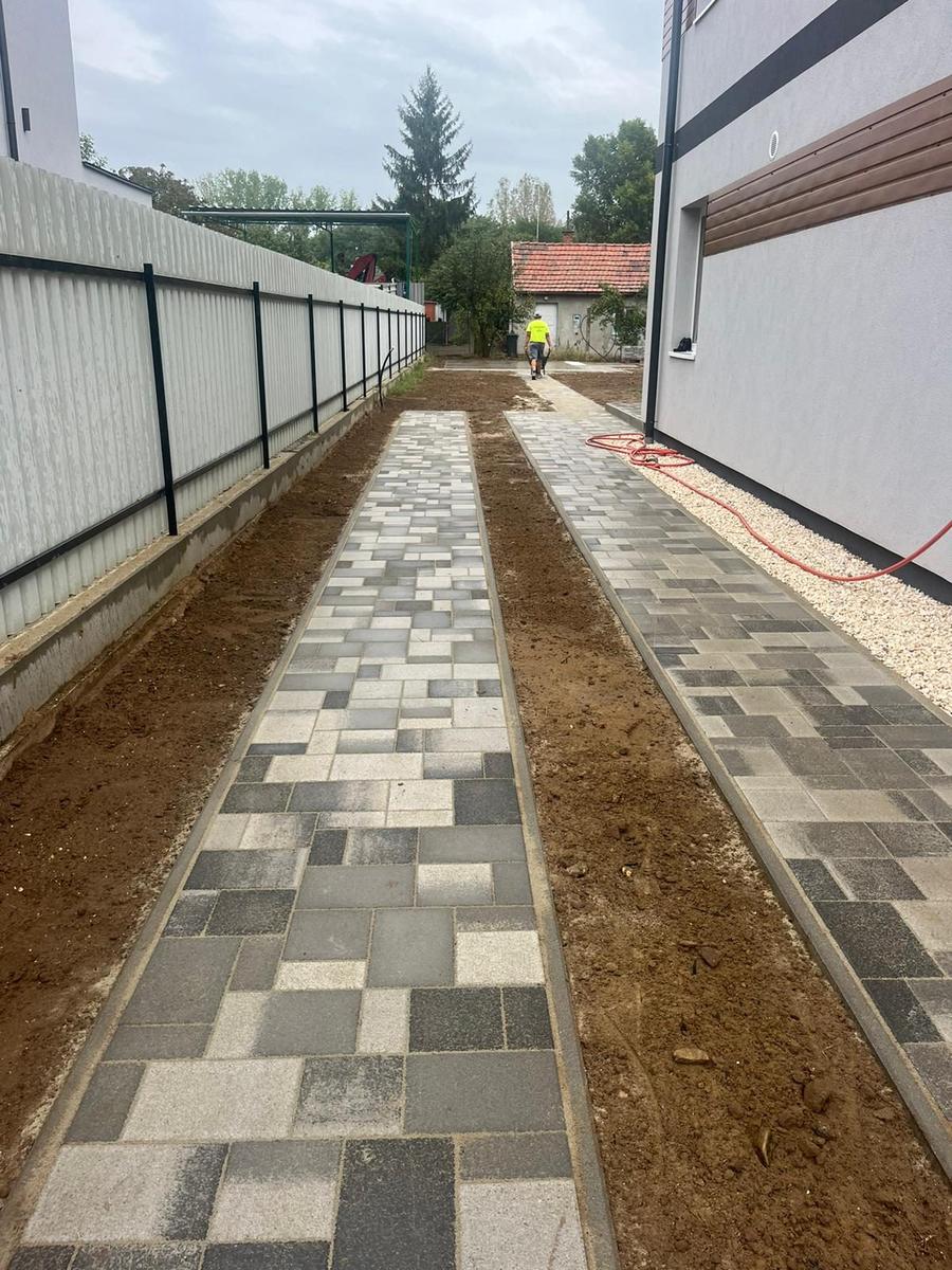 Multi-size grey block paved paths